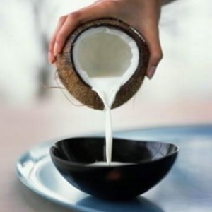 coconut oil being poured into bowl