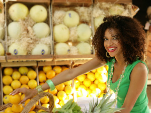 beautiful African American women buying produce