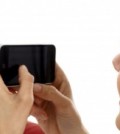 woman holding smart phone