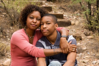 woman holding her son