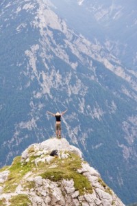 woman at top of peak
