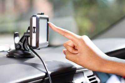 woman touching gps