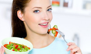 woman eating a salad
