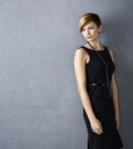 an attractive woman in a black dress