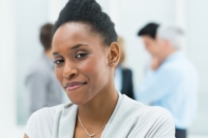 African American business woman smiling proudly