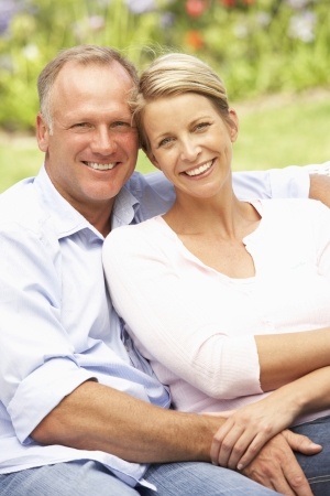 mature couple with arm around each other