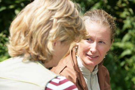 two mature women talking