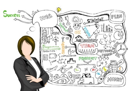 woman in suit looking at notes for business