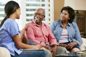 nurse with senior couple