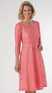 mature woman wearing pretty pink lace dress