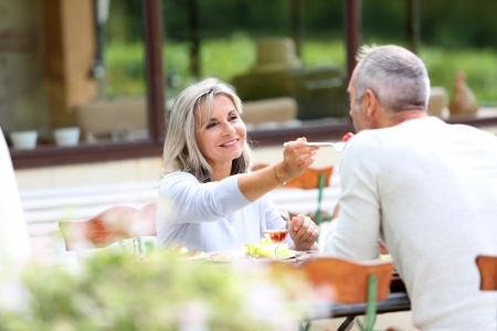 mature couple having dinner