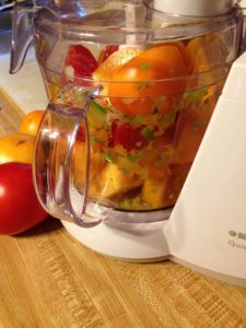 Vicki Boster photo of food processor with tomatoes - Copy