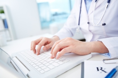nurse working on computer