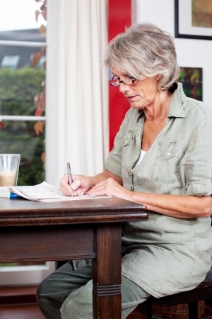 mature woman working at home