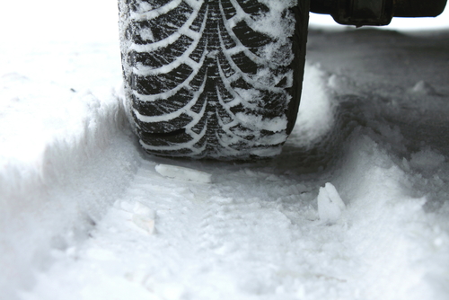 car tire in snow