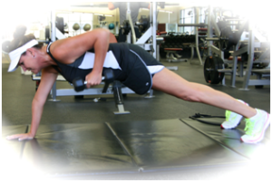 52-year old Michelle doing a row from plank position